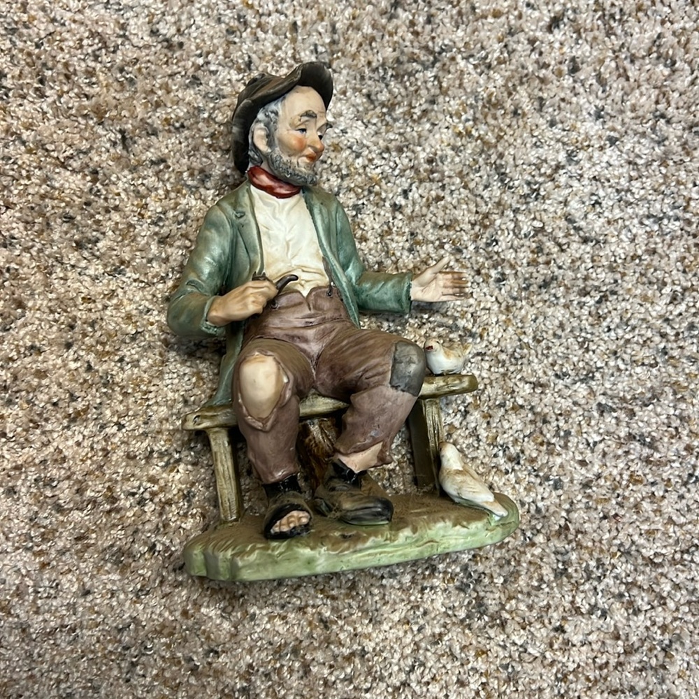 LEFTON vintage hobo man on bench with birds figurine.